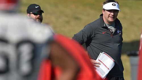 Georgia coach Kirby Smart was more concerned about bigger picture issues than his quarterback as prseason camp opened. (Brant Sanderlin/bsanderlin@ajc.com)