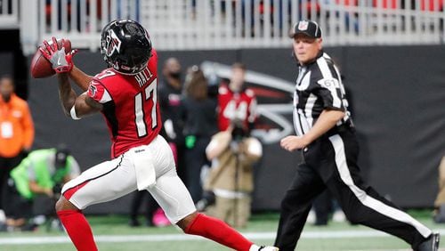 Atlanta Falcons Marvin Hall (17) makes a touchdown catch against the Miami Dolphins during the first half of an NFL football game, Sunday, Oct. 15, 2017, in Atlanta. (AP Photo/David Goldman))