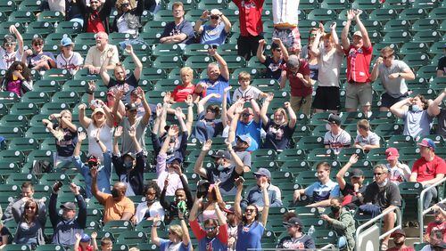 Braves fans get the wave going during a game at Truist Park on April 15, 2021.  “Curtis Compton / Curtis.Compton@ajc.com”