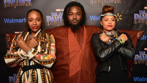 Atlanta moviegoers put pride on display with African influenced outfits at an advance screening hosted by T.I. and Walmart. Image by Aric Thompson.