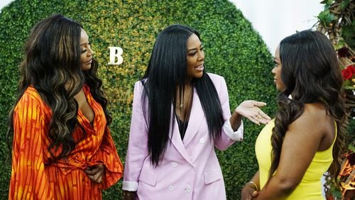THE REAL HOUSEWIVES OF ATLANTA -- Pictured: (l-r) Cynthia Bailey, Kenya Moore, Kandi Burruss -- (Photo by: Annette Brown/Bravo)