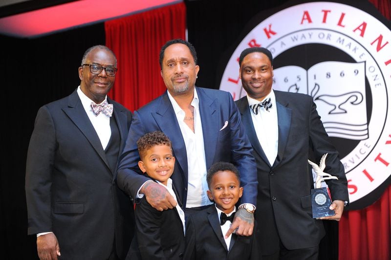 Clark Atlanta University President Ronald A. Johnson (left) poses for a photo with Kenya Barris (center) and his sons. On the right: National Alumni President Marshall Taggert. Contributed by Clark Atlanta University
