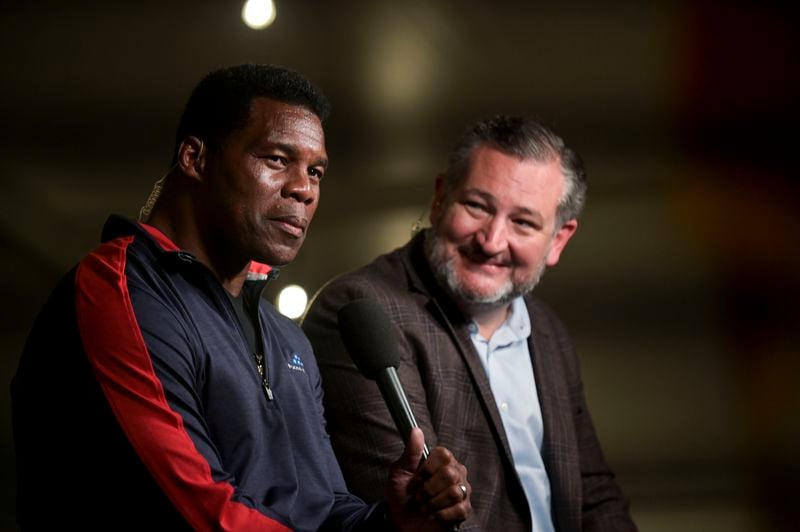 Republican U.S. Senate candidate Herschel Walker (left) and Sen. Ted Cruz, R-Texas, are seen during a campaign rally in Canton, Georgia, on  Nov. 10, 2022. (Daniel Varnado for the Atlanta Journal-Constitution)