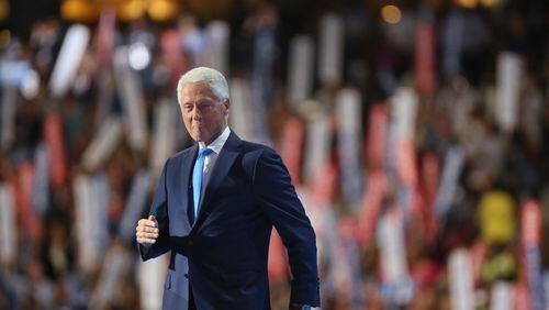 Former President Bill Clinton struts on stage at the Democratic National Convention. Miguel Martinez/MundoHispanico