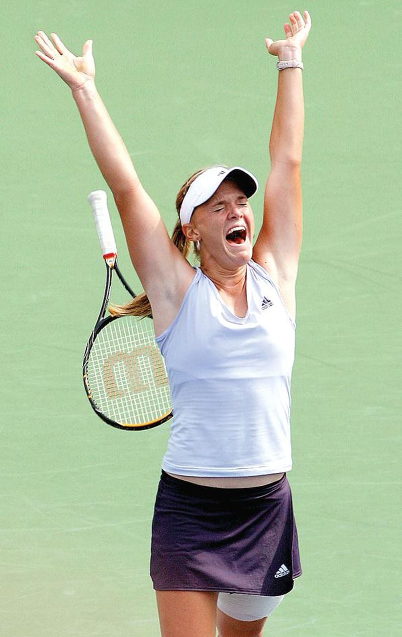 Melanie Oudin celebrates her 1-6, 7-6(2), 6-3 upset victory over Russia's Nadia Petrova in the fourth round of the 2009 U.S. Open. (AP Photo/Kathy Willens)
