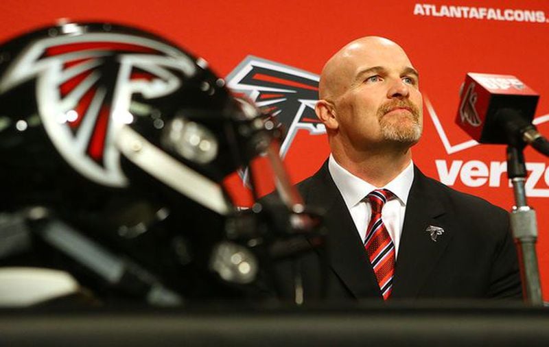 New Falcons head coach Dan Quinn said during Tuesday's introductory press conference in Flowery Branch that he would have a hand in reworking the defense with help from assistant coaches Richard Smith and Raheem Morris, but was unsure whether he would be calling plays.