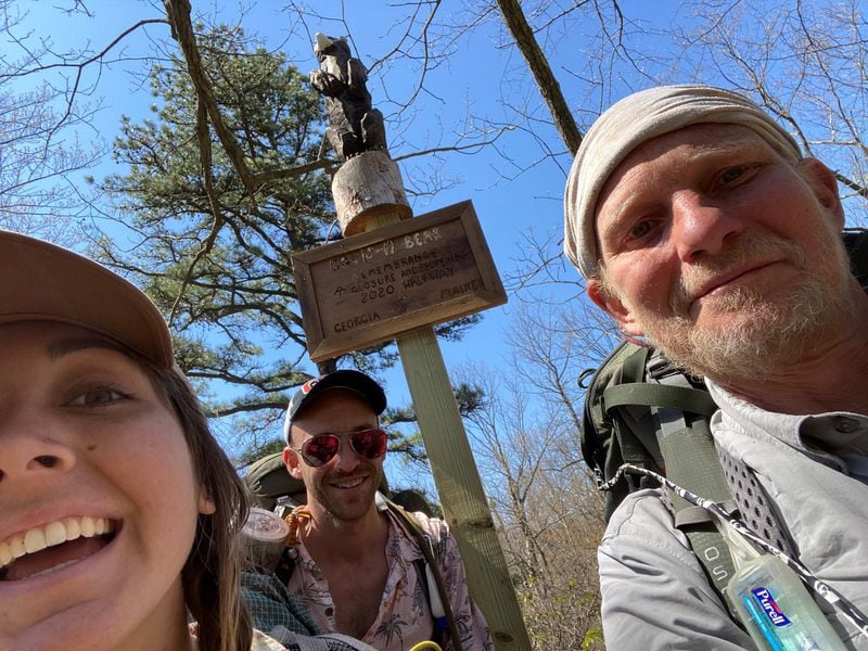 Cassidy “Nova” Bridges (left), 22, of Gainesville, began hiking north on the Appalachian Trail alone but soon encountered a group of like-minded hikers who have stayed together for hundreds of miles, including Brandon “Blue Jeans” Bingaman (center), 30, of West Virginia, and Gary “Mango” Morrison, 50, of Pennsylvania. CONTRIBUTED: CASSIDY BRIDGES