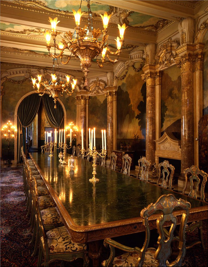 Mar-a-Lago’s dining room was photogrpahed in 1993 with Marjorie Merriweather Post’s original furniture, including her marble-topped dining table, which could seat 34 dinner guests. The room’s molding and murals are adaptations of the Chigi Palace in Rome. Post kept a notebook with photos of her nearly 30 china patterns, crystal and silverware. Some of the pieces were still in use in 1995, when Donald Trump opened the Mar-a-Lago Club. Photo / C.J. Walker