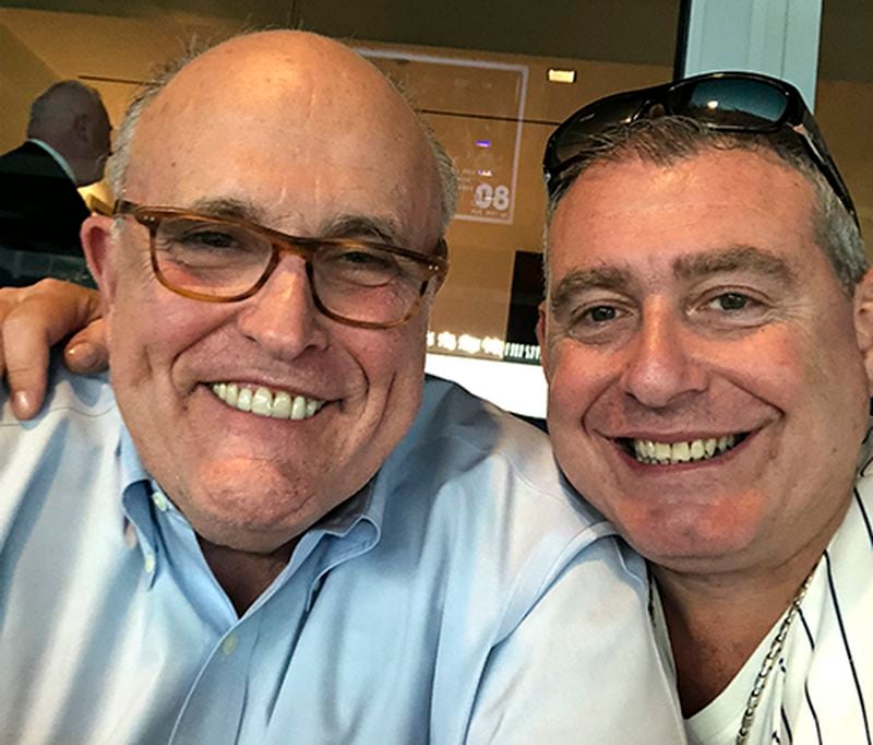 Lev Parnas is shown with Rudy Giuliani. Parnas, a close associate of Trump's personal lawyer Giuliani claims Trump was directly involved in the effort to pressure Ukraine to investigate Democratic rival Joe Biden.