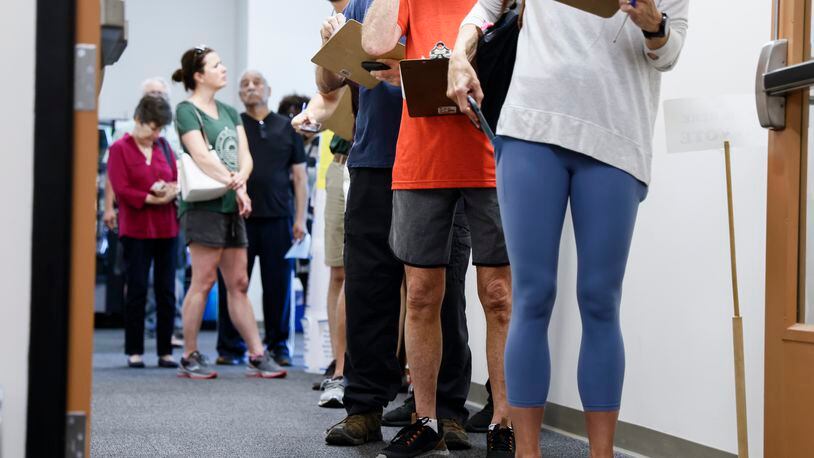 Voters wait in line at Roswell Library on the last day of early voting on Friday, May 20, 2022. (Natrice Miller / natrice.miller@ajc.com)