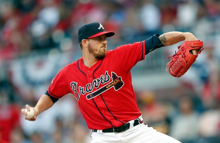 Photos: Braves break out red uniforms, host Marlins