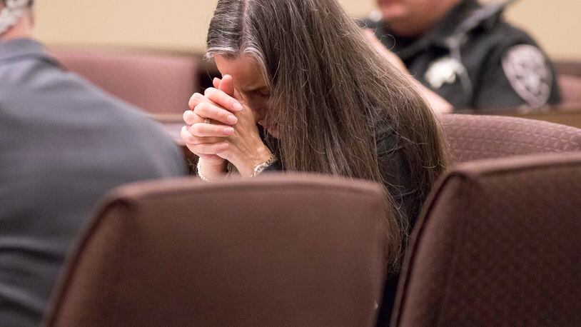 Nydia Tisdale becomes emotional while evidence is presented during a trial at the Dawson Superior Court Nov. 30, 2017. Tisdale was convicted of a misdemeanor, fined $1,000 and ordered to perform community service in connection to a Republican Party function in 2014 she tried to videotape. ALYSSA POINTER/ALYSSA.POINTER@AJC.COM