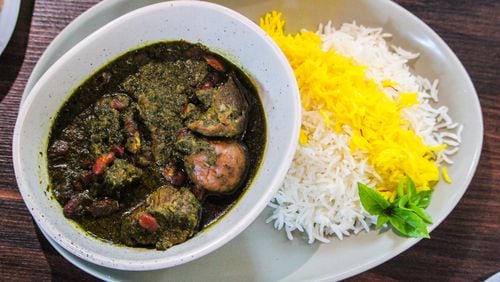 A great version of ghormeh sabzi, which roughly translates to "braised herbs," is served at Persian Basket Kitchen & Bar in Johns Creek. Courtesy of Green Olive Media