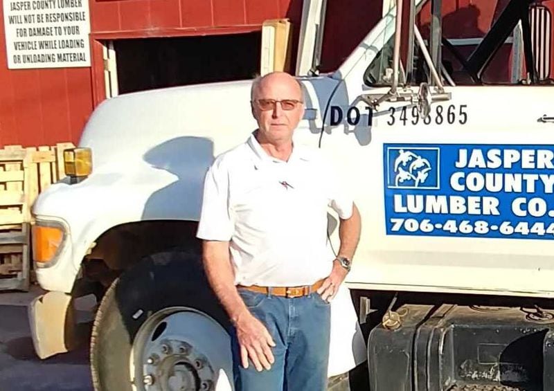 Joel Gaston, standing outside Jasper County Lumber Co., in Monticello on Nov. 9, 2020, said he voted for Donald Trump because he would handle the economy better than Joe Biden. Photo by Andy Peters, andy.peters@ajc.com