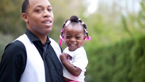Brian Jackson of Atlanta was recently awarded joint custody of his daughter Ambrianna. He’s shown with her as a toddler during happier times. CONTRIBUTED