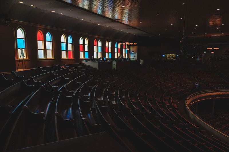 Ryman Auditorium in Nashville has stained-glass windows and pews because it was once a church. CONTRIBUTED BY RYMAN AUDITORIUM