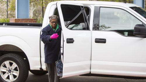 Anne Spencer exits an Uber in front of the Dorothy C. Benson Senior Complex in Sandy Springs, Georgia, on Thursday, March 8, 2018. The complex uses a liaison to schedule Uber and Lyft rides for the senior community. (REANN HUBER/REANN.HUBER@AJC.COM)