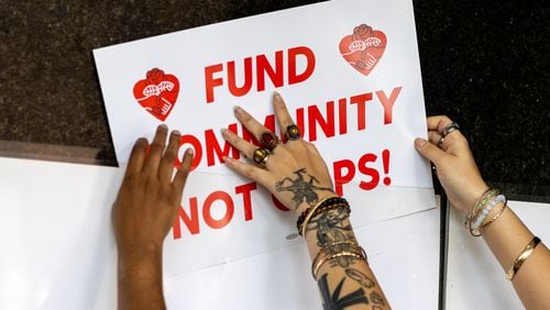 Protesters gather outside Atlanta City Hall ahead of the final vote to approve legislation to fund the public safety training center on Monday, June 5, 2023. (Arvin Temkar / arvin.temkar@ajc.com)