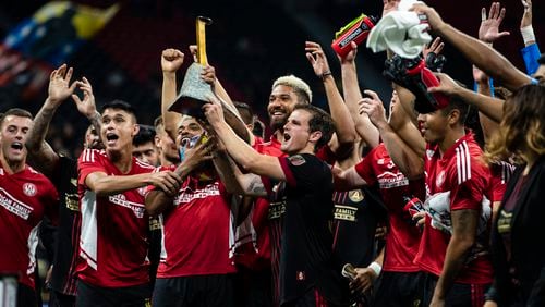 Atlanta United players celebrate after the match against Pachuca on Tuesday night at Mercedes-Benz Stadium. (Photo by AJ Reynolds/Atlanta United)