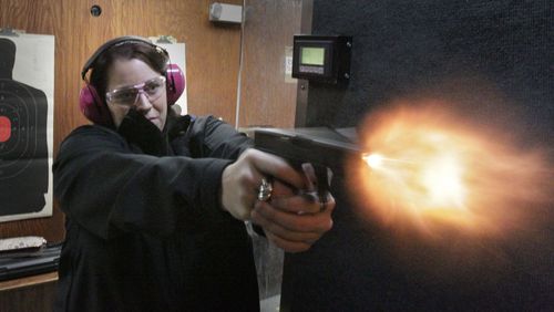 Sydni Lee, from Dahlonega, fires her Glock 19 at the Bulls Eye Marksman Gun Club range in Cumming in this AJC file photo. Women are reportedly the fastest growing segment of Americans becoming gun owners. "Sisters in Arms" is a local women's shooting group that regularly holds events at the Bulls Eye Gun Club. BOB ANDRES BANDRES@AJC.COM