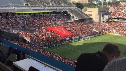 Atlanta United unveils a tifo before Saturday’s game against Colorado Rapids at Georgia Tech.