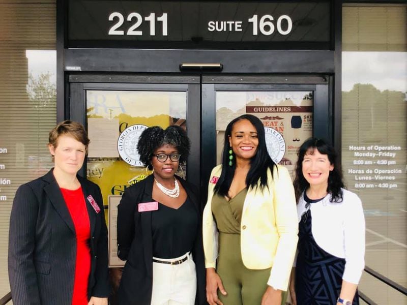 (L-R) State Reps. Rebecca Mitchell, Jasmine Clark, Donna McLeod and Dacula resident Amanda Shorts stand outside the Norcross center for the Georgia Department of Labor on Thursday, June 24. (Courtesy of Amanda Shorts)