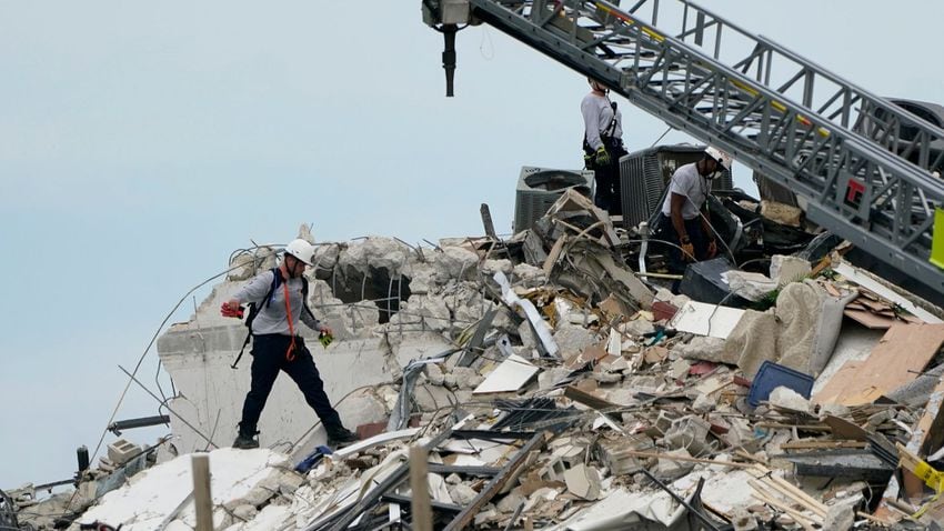 Search continues for nearly 100 people still missing from collapsed condo near Miami