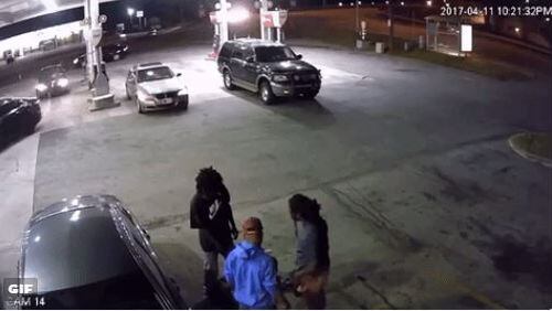 An apparent robbery was caught on camera outside a DeKalb County gas station. (Credit: Channel 2 Action News)
