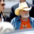 FILE - Dickey Betts, a founding member of the Allman Brothers Band, exits the funeral of Gregg Allman at Snow's Memorial Chapel, June 3, 2017, in Macon, Ga. Guitar legend Betts, who co-founded the Allman Brothers Band and wrote their biggest hit, “Ramblin’ Man,” died Thursday, April 18, 2024. He was 80. (Jason Vorhees/The Macon Telegraph via AP, File)