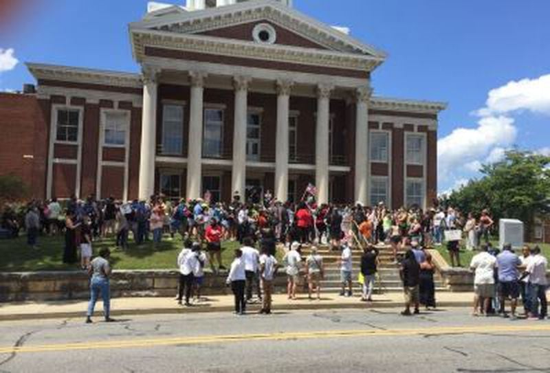 A group of roughly 200 people gathered on the steps of the Cartersville courthouse for a peaceful demonstration Saturday.