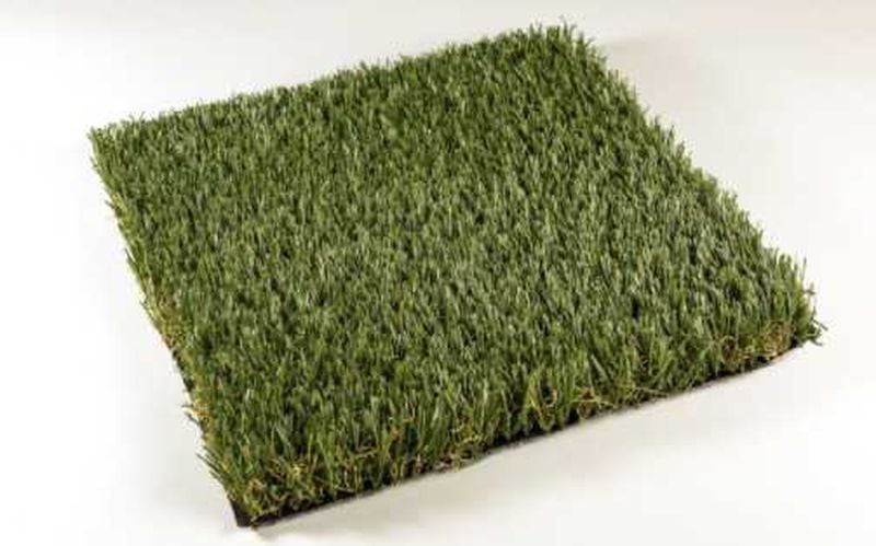 This is a sample of ProGreen's K9 Deluxe synthetic grass. The Smyrna-based company would like to replace grass on medians with it. (ProGreen)