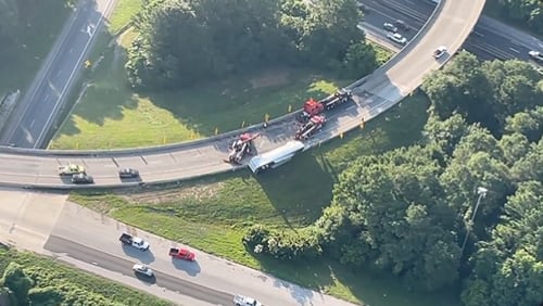 An overturned tractor-trailer blocked the I-285 South ramp onto I-20 East on Wednesday morning.