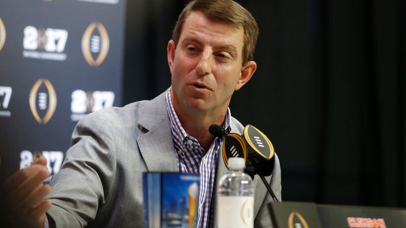 Clemson coach Dabo Swinney makes his point during national championship media day in Tampa. (Brian Blanco/Getty Images)