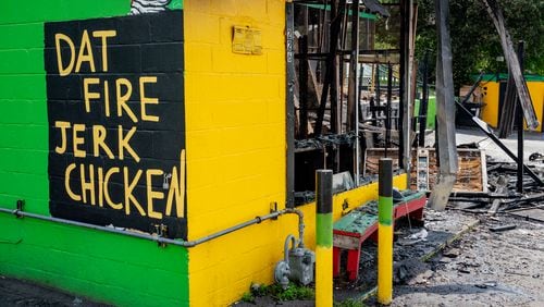 The fire broke out at the Dat Fire Jerk Chicken restaurant on Northside Drive on Saturday.