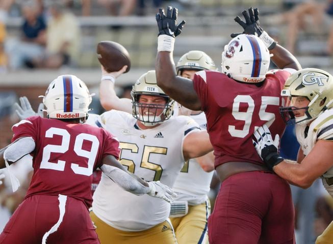 Georgia Tech Yellow Jackets offensive lineman Connor Scaglione (65) protects Georgia Tech Yellow Jackets quarterback Haynes King (10) during a football game against South Carolina State at Bobby Dodd Stadium in Atlanta on Saturday, September 9, 2023.   (Bob Andres for the Atlanta Journal Constitution)