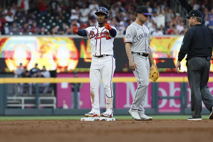 Braves second baseman Ozzie Albies (1) reacts toward the dugout after hitting a two-run double during the second inning against the Colorado Rockies at Truist Park on Thursday, June 15, 2023, in Atlanta.
(1)Miguel Martinez / miguel.martinezjimenez@ajc.com 