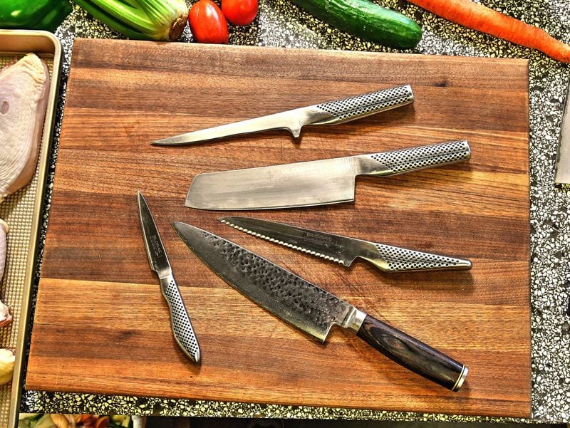Here are some knives commonly used in the home kitchen: (clockwise from top) boning knife, Nakiri knife, serrated knife, standard chef’s knife, and paring knife. CONTRIBUTED BY CHRIS HUNT PHOTOGRAPHY