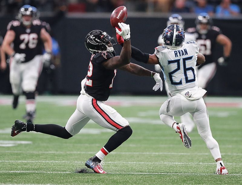 Tennessee Titans cornerback Logan Ryan breaks up a pass intended for Falcons receiver Mohamed Sanu in the first half of their game Sunday, Sept. 29, 2019, at Mercedes-Benz Stadium in Atlanta.