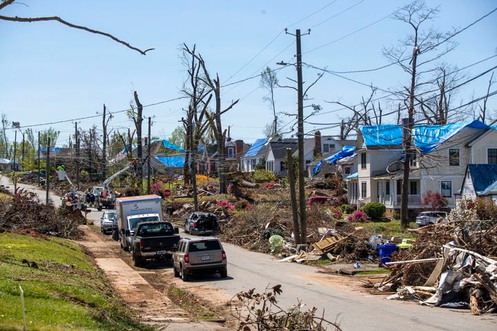 In March, an EF4 tornado tore through Heard, Coweta and Fayette counties, packing 170 m.p.h. winds, and leaving more than 1,7000 houses damaged. Several weeks later, residents in Newnan continue cleanup efforts. (Alyssa Pointer / Alyssa.Pointer@ajc.com)