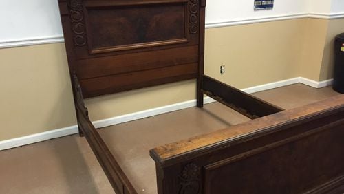 A bed frame that once belonged to Sharon Tate sold for $14,000 at a Covington auction. (Credit: Channel 2 Action News)