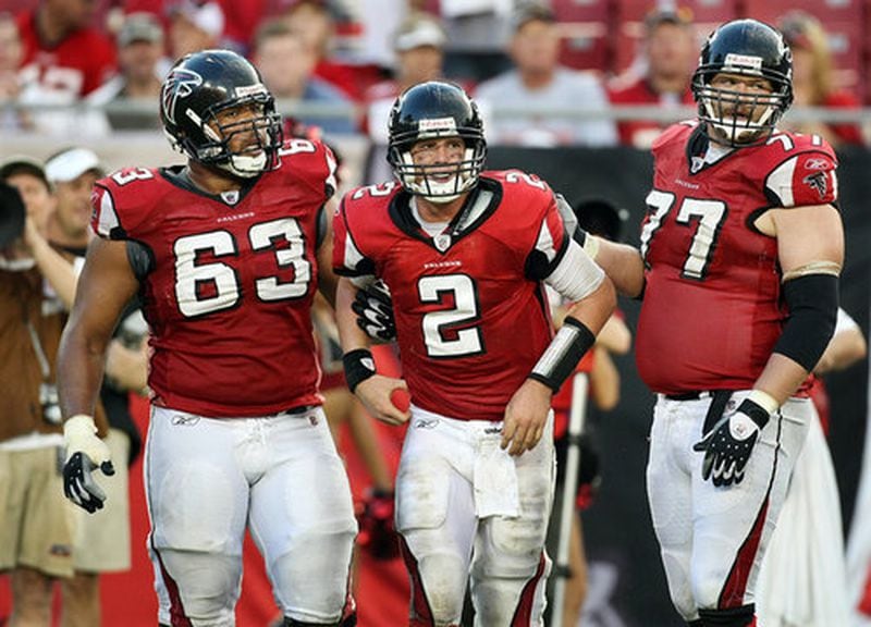 080914 TAMPA: Falcons guards #63 Justin Blalock, left, and #77 Tyson Clabo, right, help quarterback #2 Matt Ryan to his feet after he took a hard tackle by Buccaneers defensive end #90 Gaines Adams during late 4th quarter action at Raymond James Stadium in Tampa on Sunday, Sept. 14, 2008. Curtis Compton / ccompton@ajc.com FILE PHOTO: 080914 TAMPA: Falcons guards #63 Justin Blalock, left, and #77 Tyson Clabo, right, help quarterback #2 Matt Ryan to his feet after he took a hard tackle by Buccaneers defensive end #90 Gaines Adams during late 4th quarter action at Raymond James Stadium in Tampa on Sunday, Sept. 14, 2008. Curtis Compton / ccompton@ajc.co