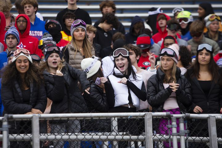 Members of the Walton student body cheer in the stands. CHRISTINA MATACOTTA FOR THE ATLANTA JOURNAL-CONSTITUTION.