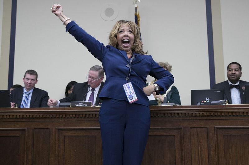 Rep.-elect Lucy McBath, D-Marietta, celebrates after drawing a low number in the lottery for congressional offices on Capitol Hill on Nov. 30, 2018. As part of the new member orientation process, incoming House freshmen take part in drawing random numbers that provide the order for selecting available congressional office space. (Photo by Win McNamee/Getty Images)