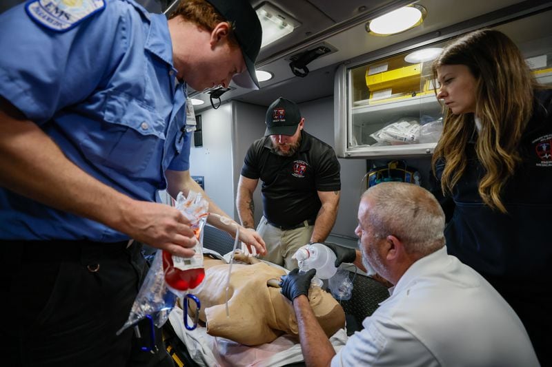 Grady EMS personnel participate in a recent training session. Lekshmi Kumar, medical director of EMS at Grady, estimates the blood transfusions could help as many as 300 of Grady’s trauma patients every year. (Miguel Martinez /miguel.martinezjimenez@ajc.com)