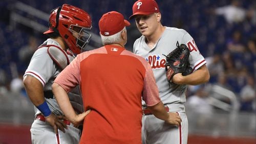 Pitching Coach Rick Kranitz #39 of the Philadelphia Phillies talks with Nick Pivetta #43 and Jorge Alfaro #38 during the second inning against the Miami Marlins at Marlins Park on September 5, 2018 in Miami, Florida.  (Photo by Eric Espada/Getty Images)