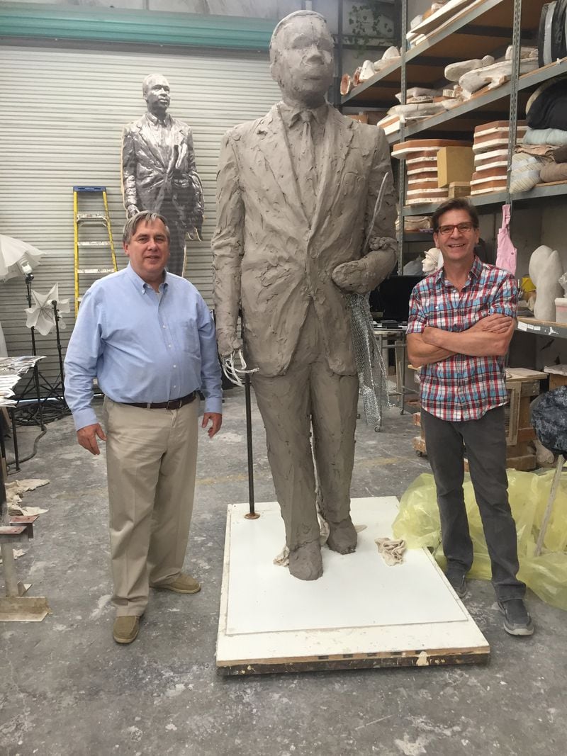 Landscape architect Mack Cain and sculptor Martin Dawe of Cherrylion Studio stand next to a partially constructed clay model of the Martin Luther King Jr. statue that is being planned for the Georgia Capitol. Courtesy of Mack Cain Landscape Architect.