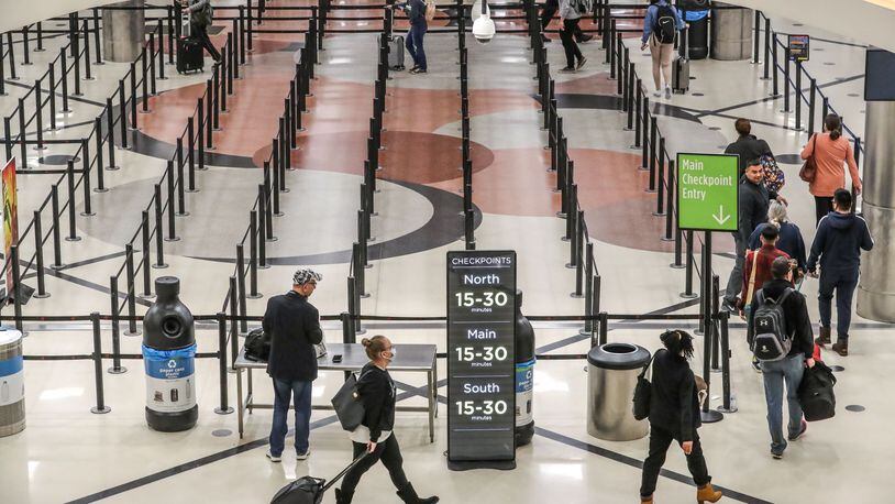 The security lines were thin at 6;34 A.M. at Hartsfield-Jackson International Airport on Friday, March 13, 2020. JOHN SPINK/JSPINK@AJC.COM