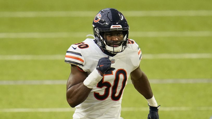 Barkevious Mingo runs down the field while playing for the Chicago Bears.  (AP Photo/Jim Mone)