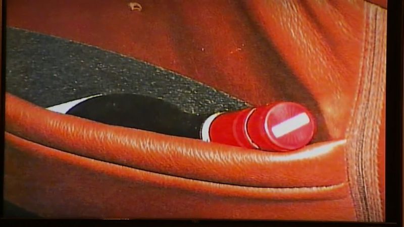 This image shows the back of the front passenger seat of the McIvers' SUV. The bullet's entry point is seen at the top. Prosecutors say that the bottle in the pouch is an open wine bottle. The image was part of Dani Jo Carter's testimony in the murder trial of Tex McIver on March 19, 2018 at the Fulton County Courthouse. (Channel 2 Action News)