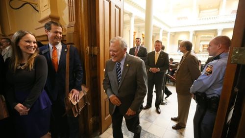 Gov. Nathan Deal enters the appropriations room at the Capitol to talk about his budget plans in January 2017